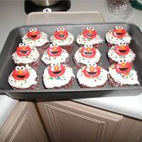 Elmo Ring Cupcakes For Preschool Class We had an elmo themed birthday and made these cupcakes with rings on top for the class at preschool.