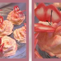 Rose Cupcakes With Butterflies Vanilla cupcakes with buttercream icing. The butterflies are made of fondant and royal icing (I read the instructions in Sylvia Coward'...