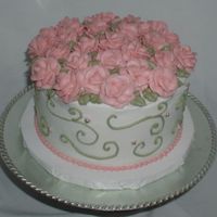 Roses White cake with raspberry cream filling and buttercream icing. I wanted to try a new white cake recipe and get more practice with roses....