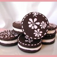 Chocolate Cookies With Buttercream Filling Chocolate Cookies with buttercream icing sandwiched between the cookies. Royal icing scribbles. Inspired by a post on the cookie board re:...