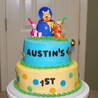 Winnie The Pooh Made for my cousin's 1st birthday. Inspired by colors from the napkins. BC w/ fondant accents