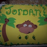 Monkey Cake vanilla caramel cake with chocolate cream cheese frosting. all decorations are satin ice!