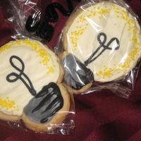 Lightbulb Cookies For a bright graduate! Actually I was already making dozens of ladybug cookies and needed a quick pair of cookies for a friend and this...