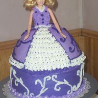 Purple Doll A doll cake fo my daughters birthday party. This is my second doll cake. I LOVED the result, as did she.