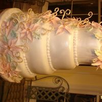 Christmas Wedding Cake Christmas Wedding Cake - marshmallow fondant airbrushed with antique white luster dust - poinsettias, holly, and scrolls made from white...