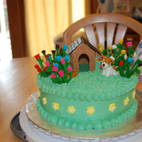 Dog And Roses This was for my daughter's 6th birthday. Butter cream icing with fondant decorations. There were 6 different color roses, six...