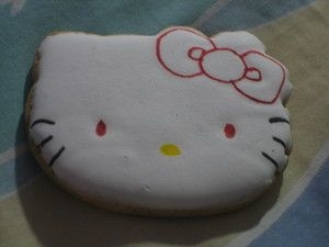 Tired Kitty at 3 am while making the cookies and my cakes i made a hello kitty with red eyes...kept me awake for a few more minutes :D
