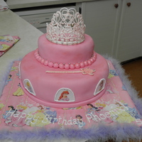 Disney Princess Tiara Cake I made this for a friends daughters' 5th birthday. It is chocolate cake, with fondant icing, and I made the tiara and wand from royal...