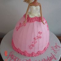 Barbie I made the dress out of two 8" rounds and a 6"round. I'm not a fan of the wondermold (I can never bake it right-- always...