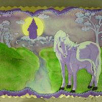 Unicorn Drawing This cake was to match a party napkin. The unicorns are a buttercream transfer. The background is airbrush and freehand drawing.