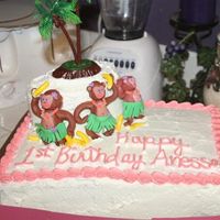 Hula Monkey Cake This is a first birthday cake using gumpaste hula monkeys. I have never used gumpaste before and had a lot of fun making these cute monkeys...