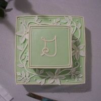 100_2862.jpg For my sister-in-law's bridal shower. Buttercream with fondant vines and flowers.