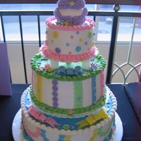 Buttons And Blossoms For Baby I created this cake for a cake show in NC. I used buttercream with fondant for buttons and flower