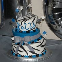 16Th Birthday Buttercream TT with fondant accents. Finally got to use extruder. Loved it!!