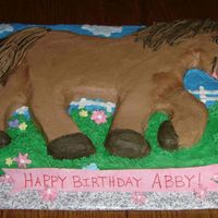 Birthday Horse Birthday cake that I made for my daughter's 4th. All buttercream w/ exception of fondant sign. Carved out from sheet cake