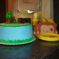 Monkey Cake This was for a monkey themed birthday party. It's an 8 inch yellow cake covered in buttercream. The monkeys and tree are made from...