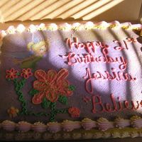 P1010283.jpg This was a simple tinker bell cake, I did for my daughter. all with buttercream icing, and I lifted the image of Tinker from her goody bags...