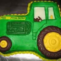 John Deere Tractor Grandfather's birthday. Model number on tractor is his birth year. Engine, wheels, and seat are all chocolate. Many thanks to LisaBa...