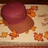 My Brother's 30Th Birthday Cap is covered in Satin Ice. Brim is 50/50 paste. Leaves are Satin Ice with color dust. '77' is the year he was born. Inspiration...