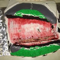My 1St Cake-Tastophy Nascar theme, just slid right off and broke in two. I only made it to the end of my street. Luckily it was for a close friend who was ok...
