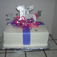 Purple And Pink Sweet 16 This customer wanted a purple and pink cake with a touch of silver on it. This is what I came up with and they loved it, The loops are made...