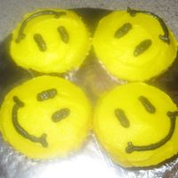 Smile!! More cupcakes for the cake walk.