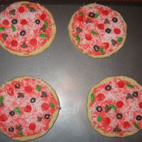 Pizza!! These were my 6 year old daughters idea. We made them for her school carnival. It was alot of fun!!