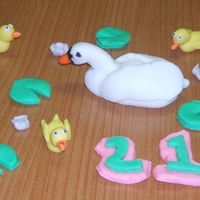 Pond Creatures I'm 16 years old, and this is for my boyfriend's sister, who is turning 21. It is my first time working with fondant, so it isn&#...