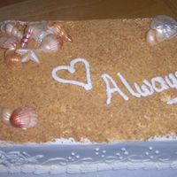 Beach Bridal Shower White chocolate shells with luster dust. Sand is crushed graham crackers.