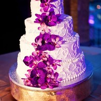 Purple Orchid Scrolled Wedding Cake All buttercream, iced and piping. The flowers are fresh orchids. This photo is from the wedding photographer, not me. 6"/9"/12&...