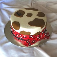 Western Cake All buttercream, fondant bandana trim, buttercream "barbed wire" border and brand of the recipients' initials. 8" round...