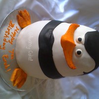 Madagascar Penguin Cake Fondant covered, modeling chocolate beak and feet. Three 8" layers, one 7", one 6" - all rounds, carved to shape. Filled and...