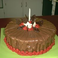 Chocolate Bar Cake 2 layer Cholocate cake with melted chololate bars drizzled over the edges