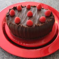 Chocolate Cake With Raspberry Filling & Ganache Chocolate cake with Raspberry filling & covered in ganache with fresh raspberries