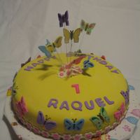 Butterfly Fondant covered cake with gumpaste butterflies. Hand painted butterflies.