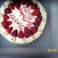 Strawberry Cake Done for a co-worker's birthday. Strawberry cake with strawberry preserve filling, BC frosting and fresh strawberries on top