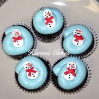 Snowman Cupcakes These were for my daughters christmas party at school. Chocolate cupcakes with vanilla buttercream and fondant decorations. Disco dust for...