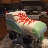 Rollerskate Cake This is a cake I did for a friend at work. I carved an 11x15 then frosted and covered in MMF. I used Rice Krispy Treats for the wheels and...