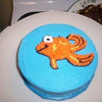 Collin's Smash Cake Buttercream icing and decorations Dorothy(Elmo's pet fish) was freehanded