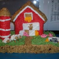 On The Farm! Strawberry sheet cake, house is sourcream pound cake, buttercream icing, silo is cookies, there are also some pretzels, graham crackers and...
