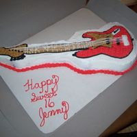 Fender Guitar Chocolate cake covered in buttercream. I used the Wilton's guitar cake pan and extended the neck using a small square cake carved.