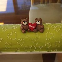 Birthday Cake Swedish Princess log-cake. Layers of vanilla sponge, raspberry jam, vanilla custard and whipped fresh cream on top. Covered with marzipan...