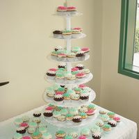 Shower Of Daisies Cupcake tower for a bridal shower. I used a variation of teal for my rolled fondant daisy cut outs.