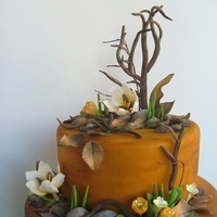 Nature Rebuilds Itself After The Great Ire In Mount Carmel The burnt tree, and branches, thburnt leaves and the stones are all from sugarpaste.So are the flowers and the green leaves and grass.They...