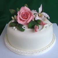 Elegant Cake All the flowers and leaves are sugarpaste flowers.I used dusting colours.Thanks for looking.