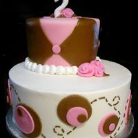 Maddy Cake buttercream (white) and MMF (brown/pink)6" + 10" rounds