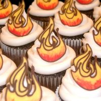 Fire + Icing needed a non-girly theme for the guys at harley davidson (the gals liked them too!)cupcakes with buttercream swirl and candy melt flame