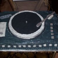 For A Dj Turntable cake. Buttercream icing with fondant accents.