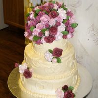 Pink & Burgandy Roses Chocolate chocolate chip w/raspberry filling and BC frosting10' 8' 6'. Gumpaste and fondant roses.