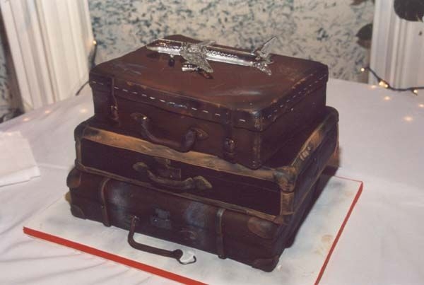 Luggage Wedding Cake My favorite cake I've done to date! 2 12x18's one 11x15 fondant covered to look like distressed luggage